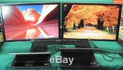 2 Dell UltraSharp 2407WFP 24 Widescreen LCD Monitors With Dell Dual Stand
