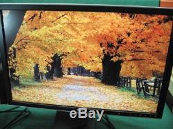 2 Dell UltraSharp 2407WFP 24 Widescreen LCD Monitors With Dell Dual Stand